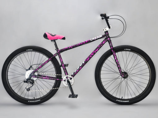 Bomma 27.5 Inch Purple Splatter Mafia wheelie bike at Dewitt Bikeworks